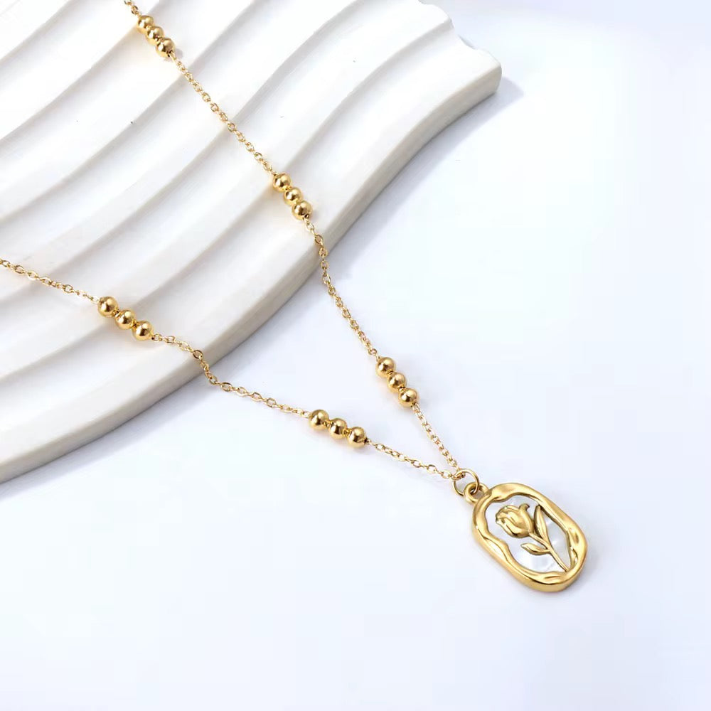 Gold Floral Charm Necklace |