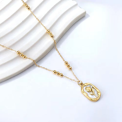 Gold Floral Charm Necklace |
