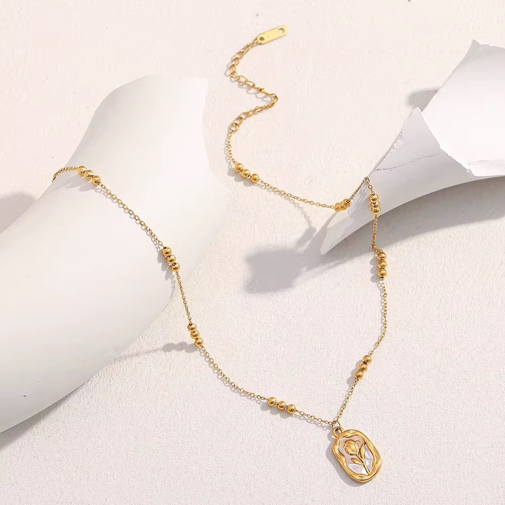 Gold Floral Charm Necklace |