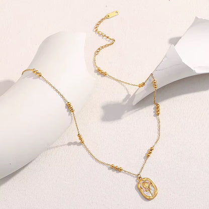Gold Floral Charm Necklace |