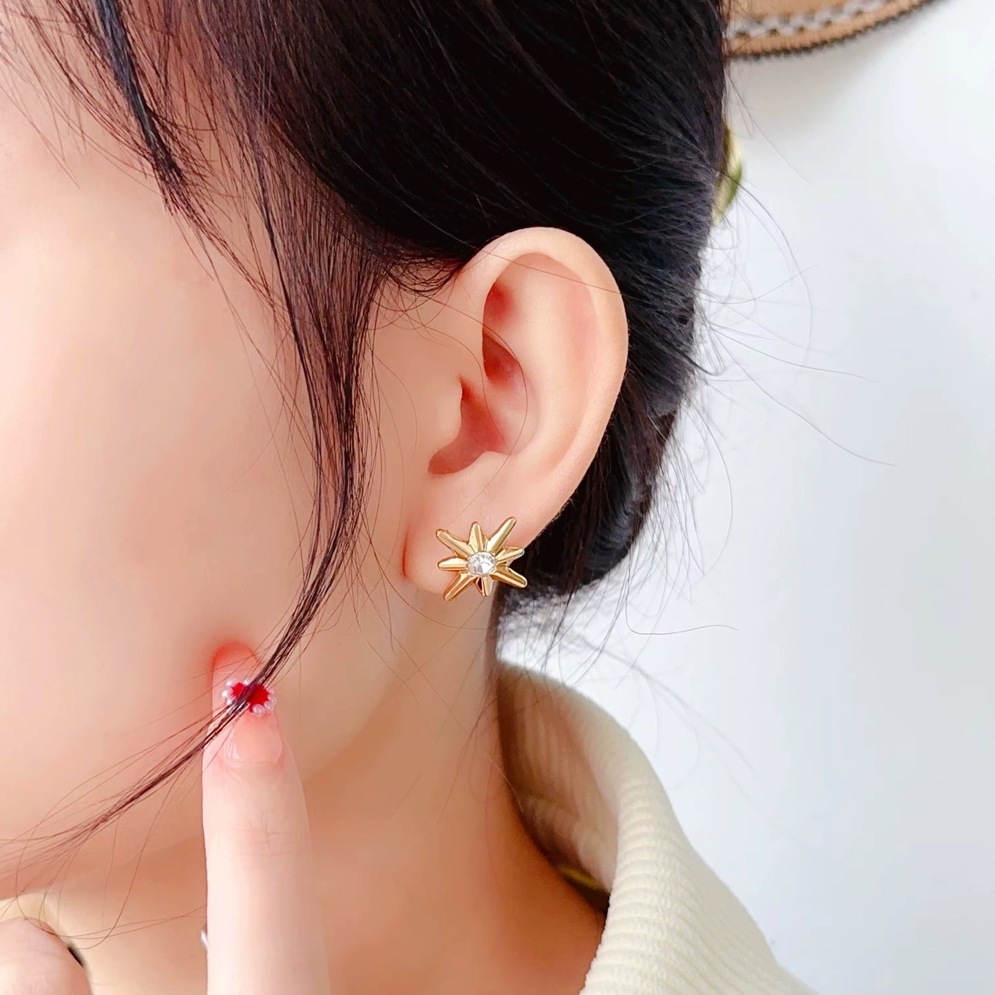 Gold Starburst Stud Earrings