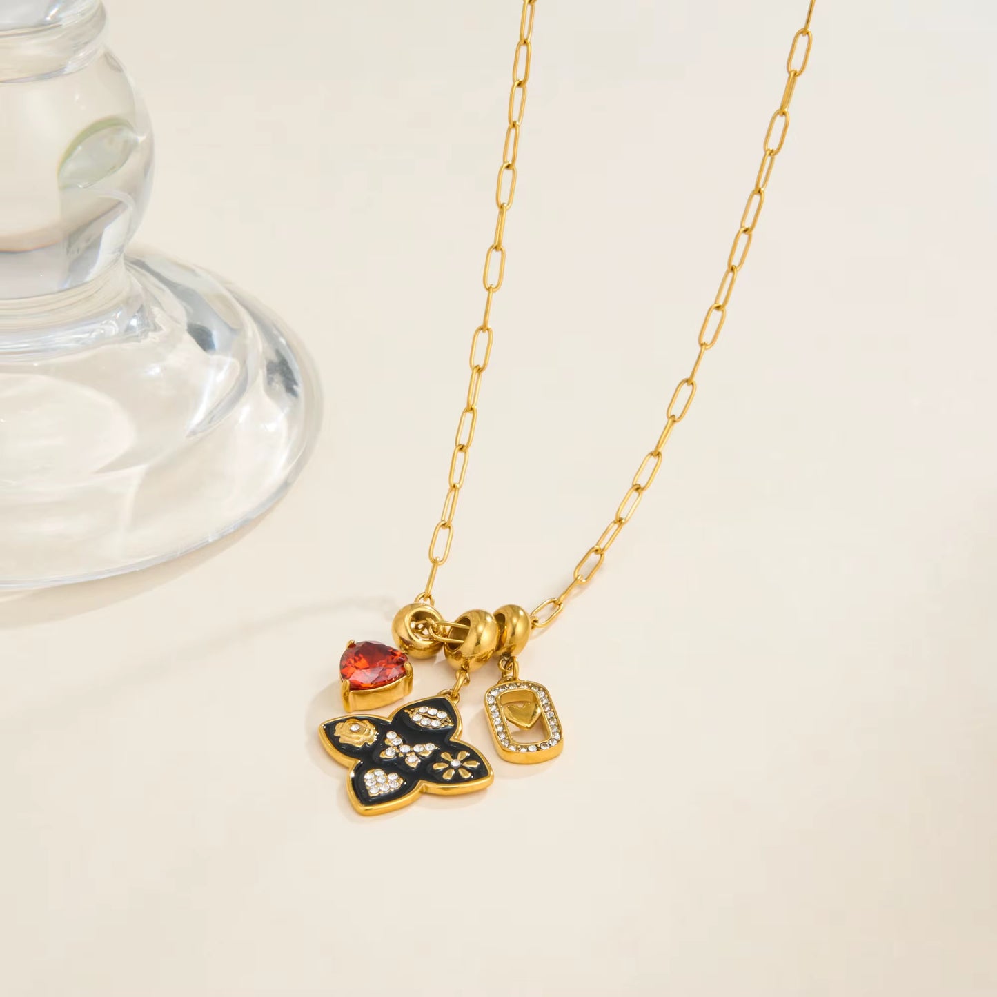 Multi-Charm Gold Pendant Necklace