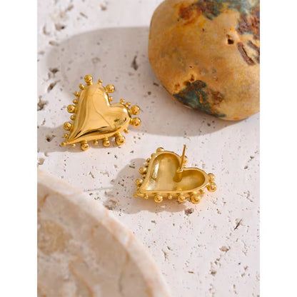 Golden Heart Statement Stud Earrings